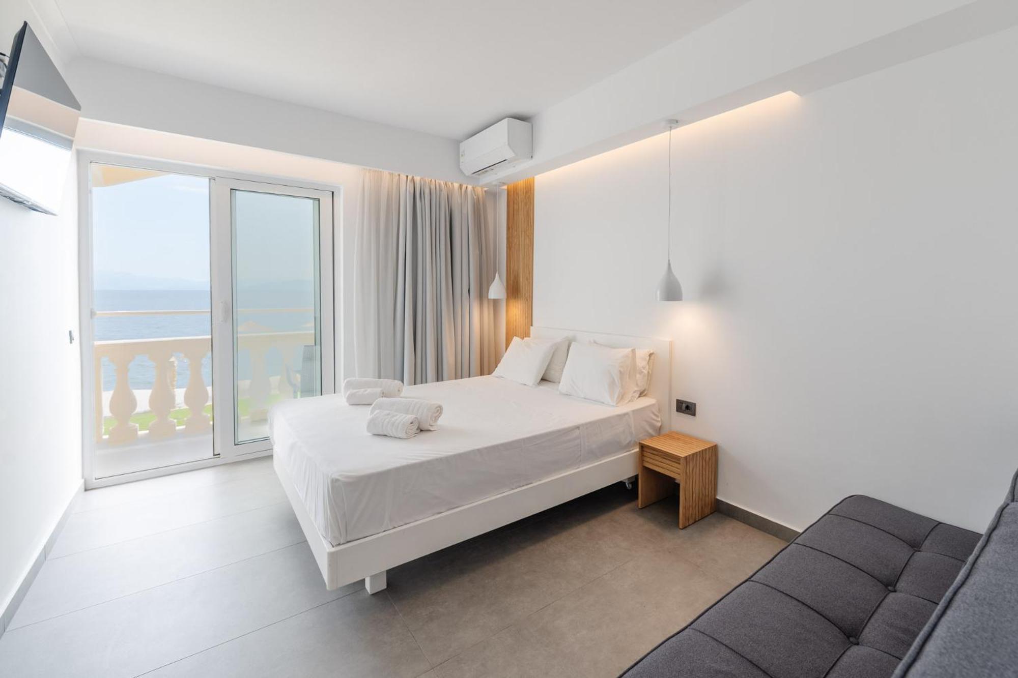 Deluxe Suite Balcony Pontikonisi island view