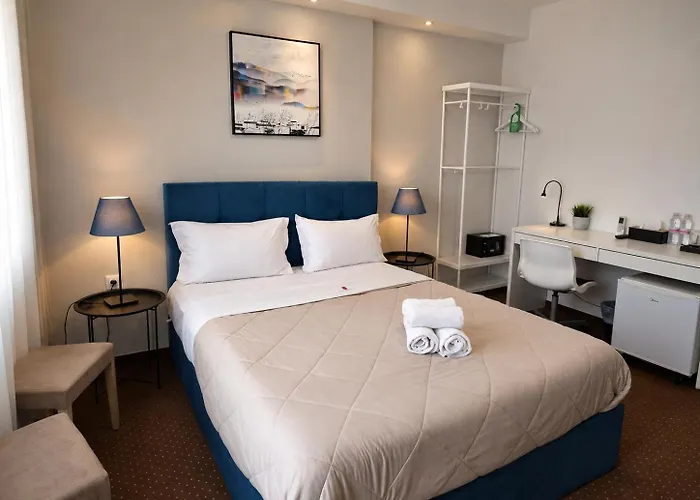 City Plaza Apartments & Rooms